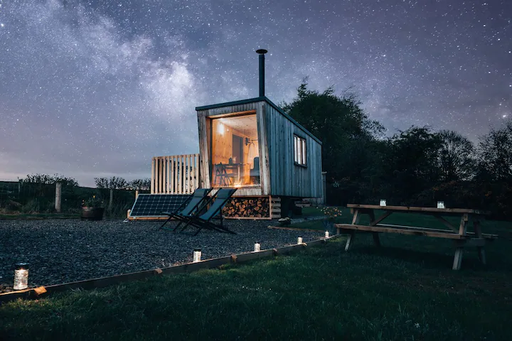 picture of a cottage overlooking fields