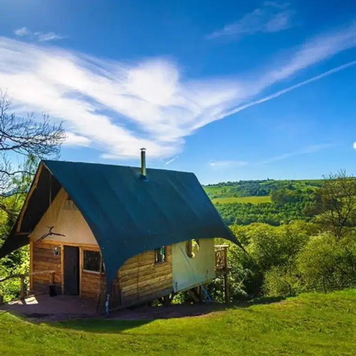 picture of a cottage overlooking fields